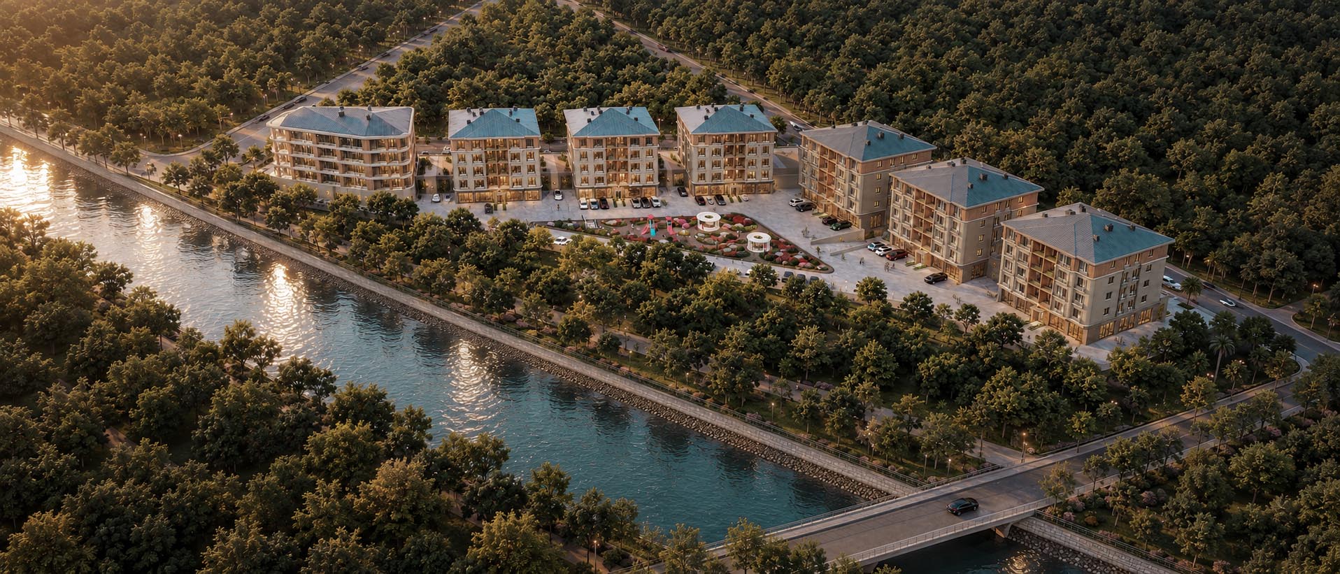 Aerial view of Valora Park Residences beside the river at sunset, with the blocks arranged around a central garden